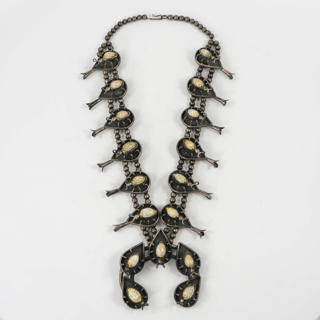 1970s Cowrie Shell Bug Squash Blossom by Vintage Collection - Garland's