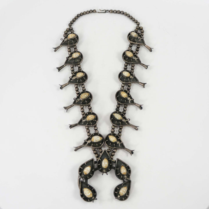 1970s Cowrie Shell Bug Squash Blossom by Vintage Collection - Garland's
