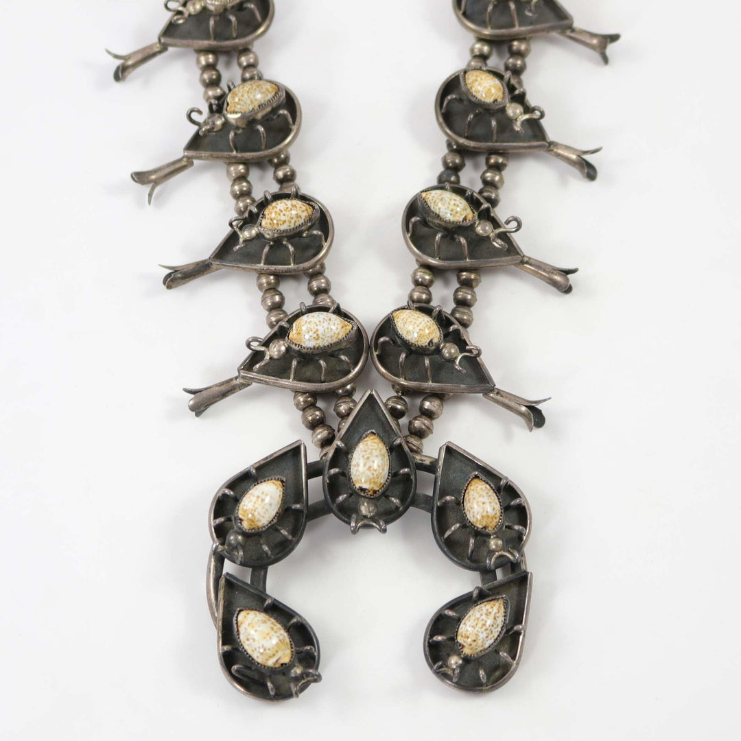 1970s Cowrie Shell Bug Squash Blossom by Vintage Collection - Garland's