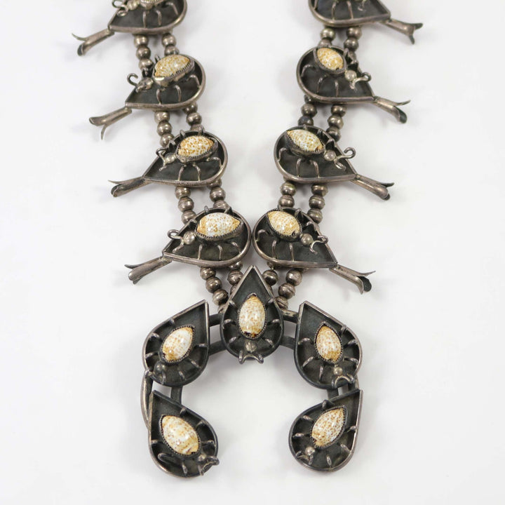 1970s Cowrie Shell Bug Squash Blossom by Vintage Collection - Garland's