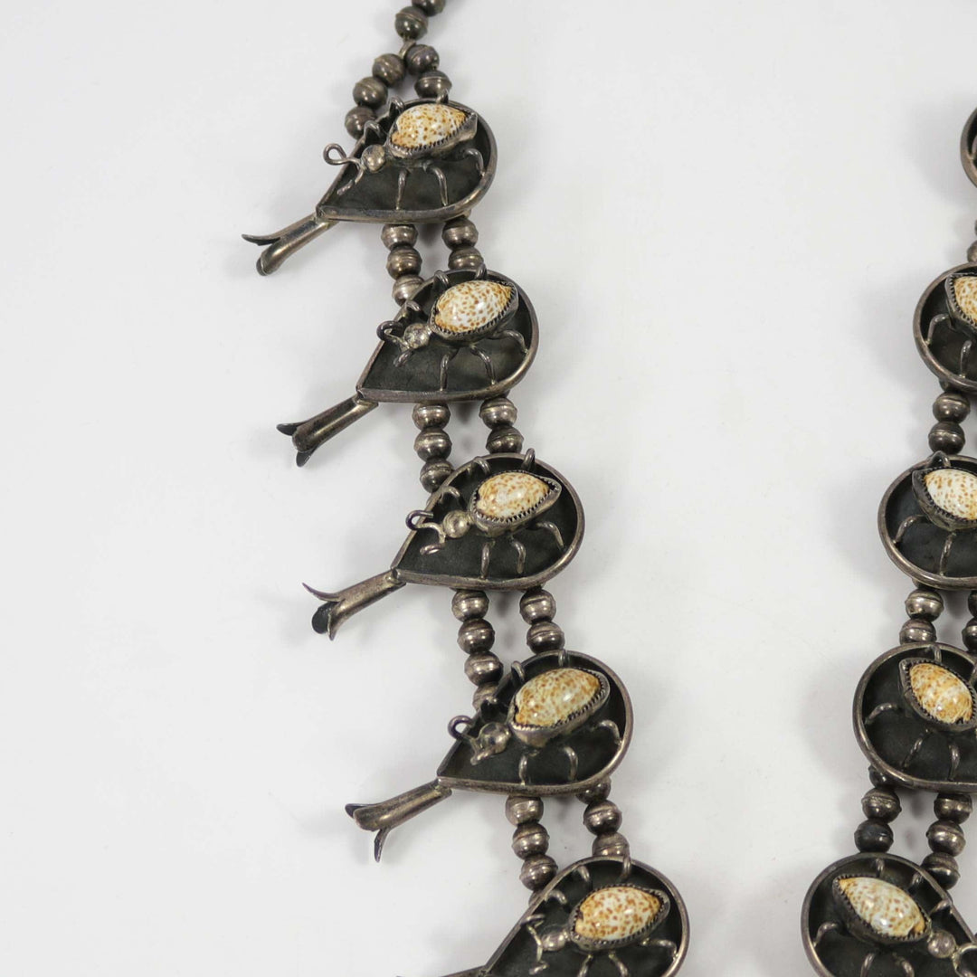 1970s Cowrie Shell Bug Squash Blossom by Vintage Collection - Garland's