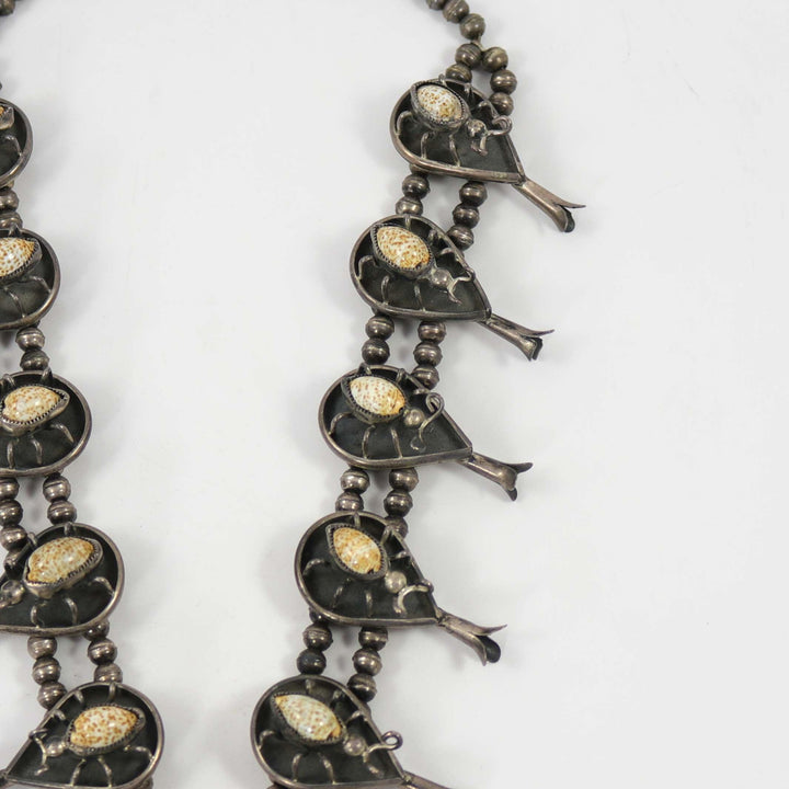 1970s Cowrie Shell Bug Squash Blossom by Vintage Collection - Garland's
