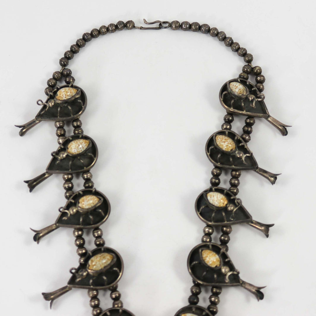 1970s Cowrie Shell Bug Squash Blossom by Vintage Collection - Garland's