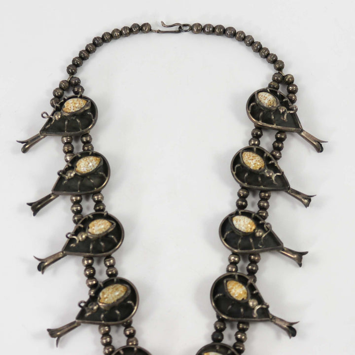 1970s Cowrie Shell Bug Squash Blossom by Vintage Collection - Garland's