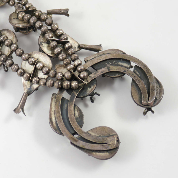 1970s Cowrie Shell Bug Squash Blossom by Vintage Collection - Garland's
