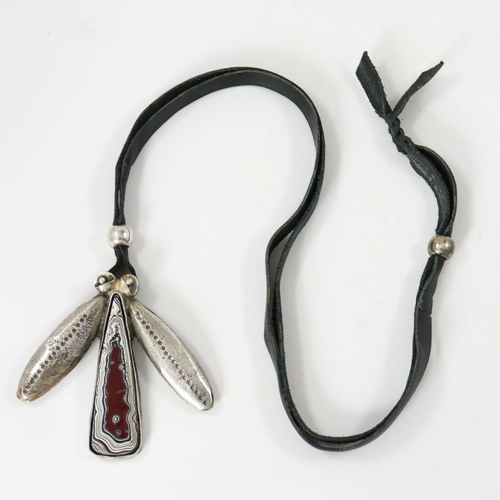 Fordite Bug Pendant
