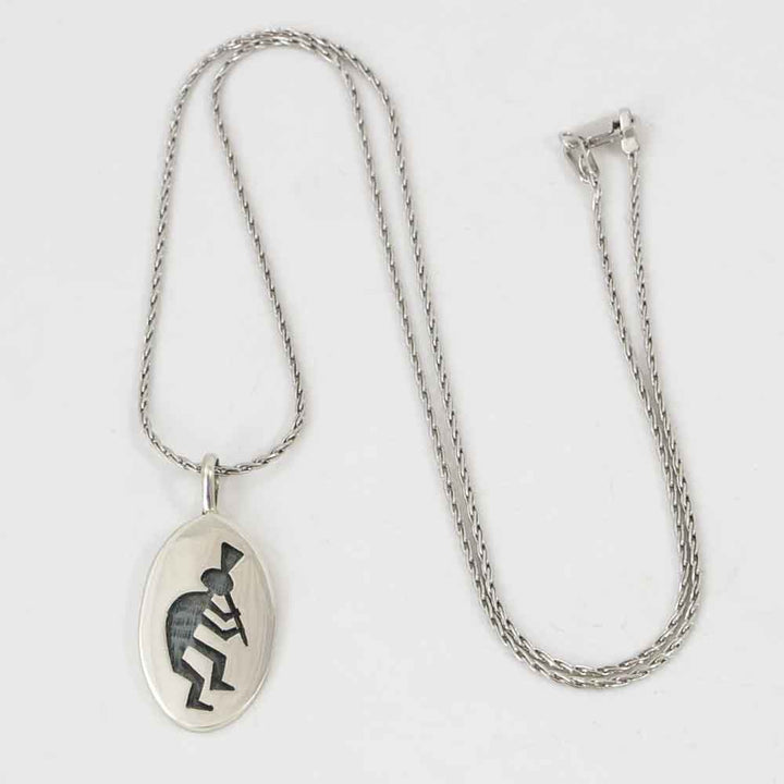 Flute Player Pendant