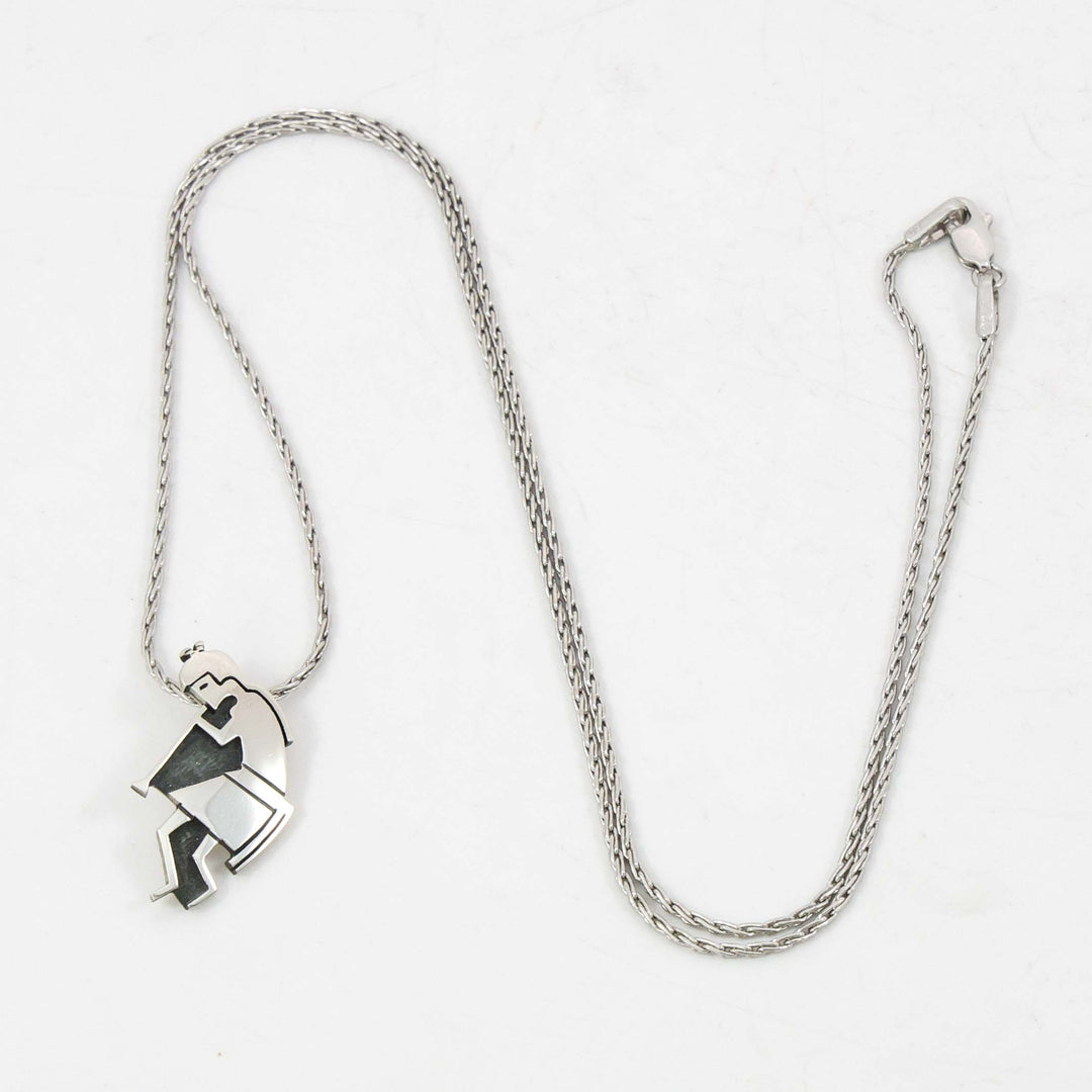 1980s Flute Player Pendant