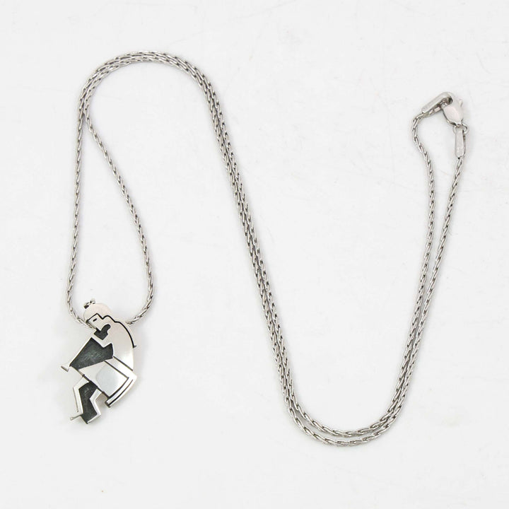 1980s Flute Player Pendant