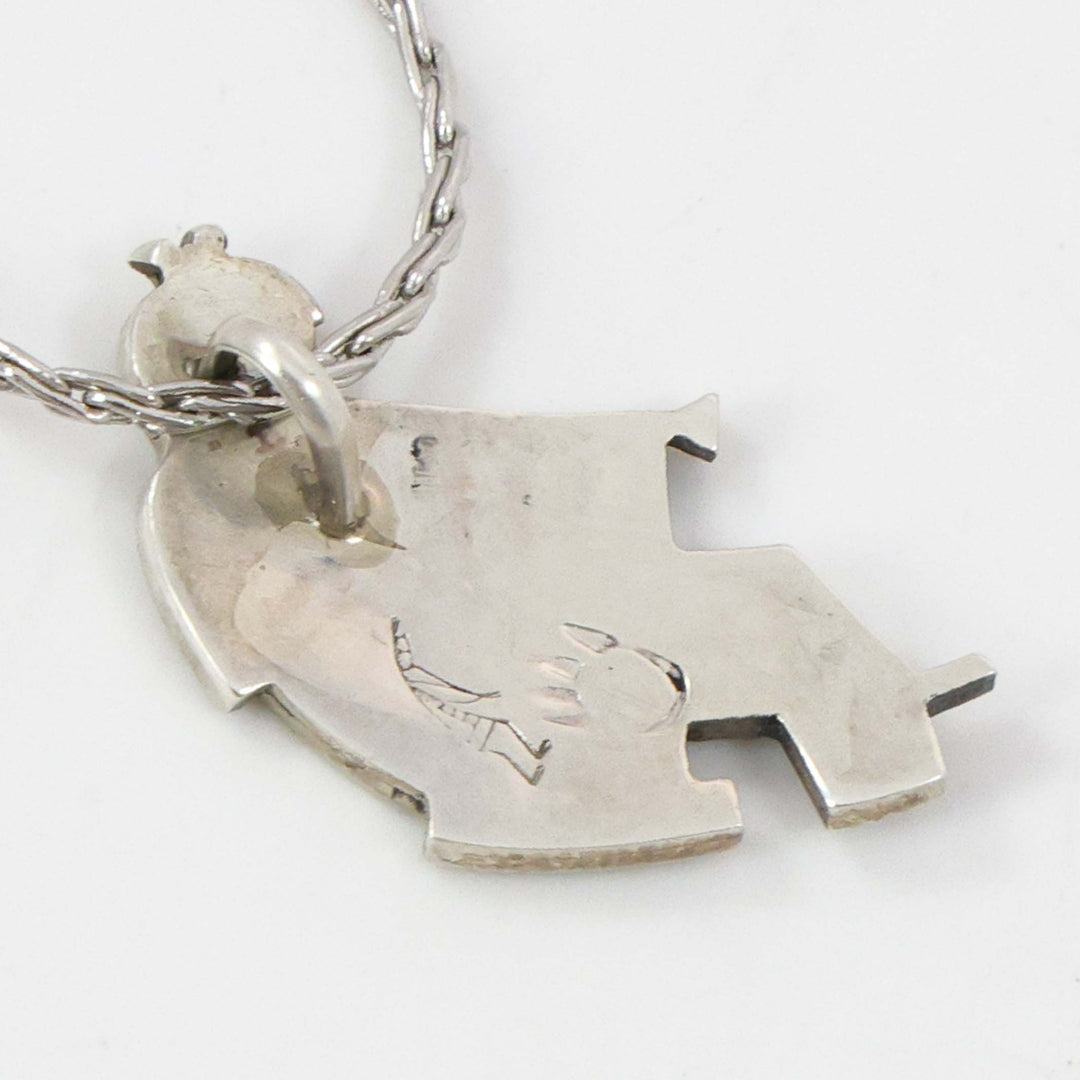 1980s Flute Player Pendant