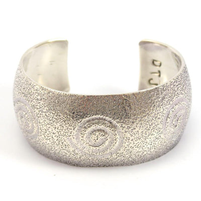 Migration Swirl Cuff by Derrick Joe - Garland's