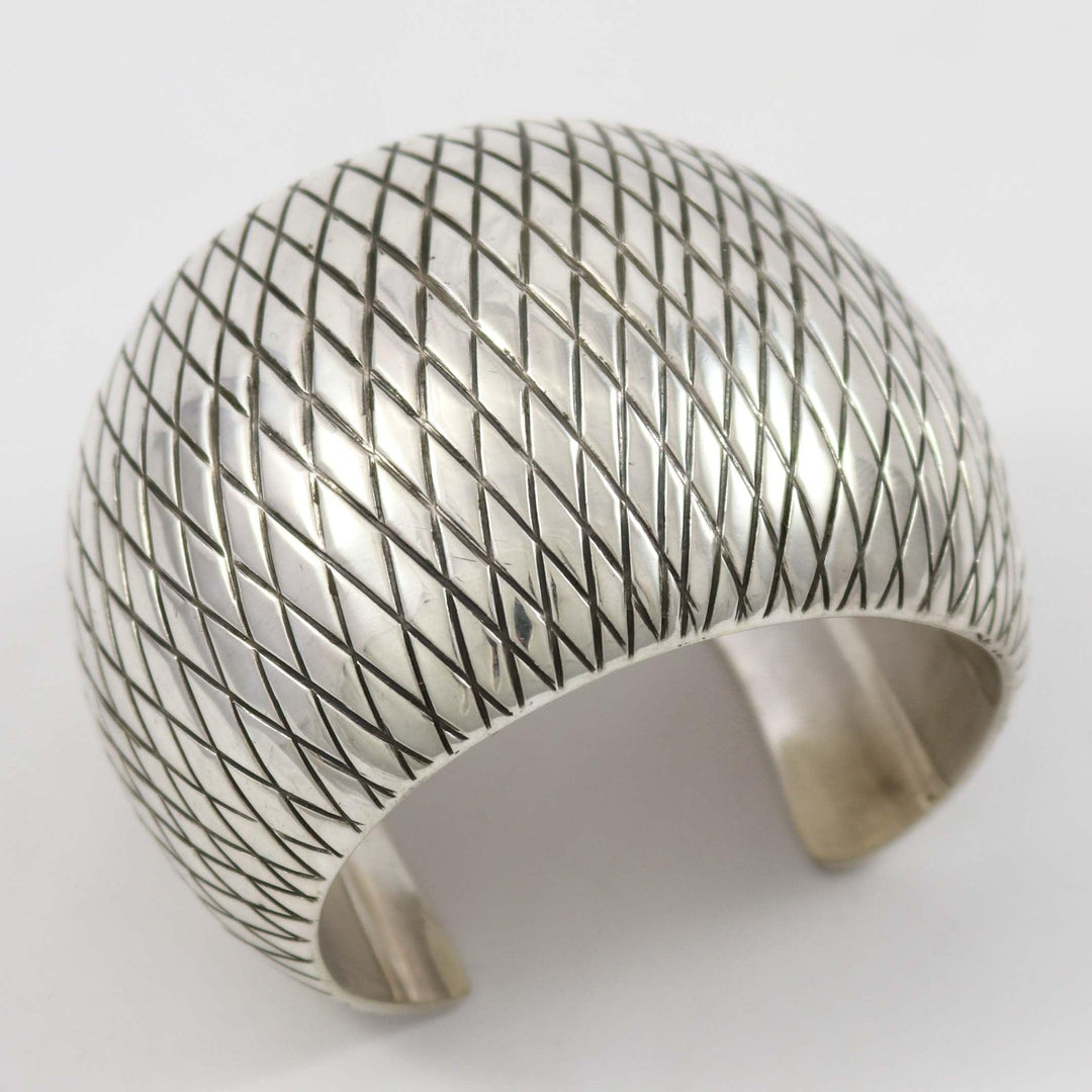 Wide Stamped Silver Cuff by Orville Tsinnie - Garland's