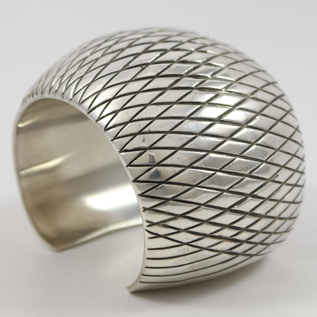 Wide Stamped Silver Cuff by Orville Tsinnie - Garland's