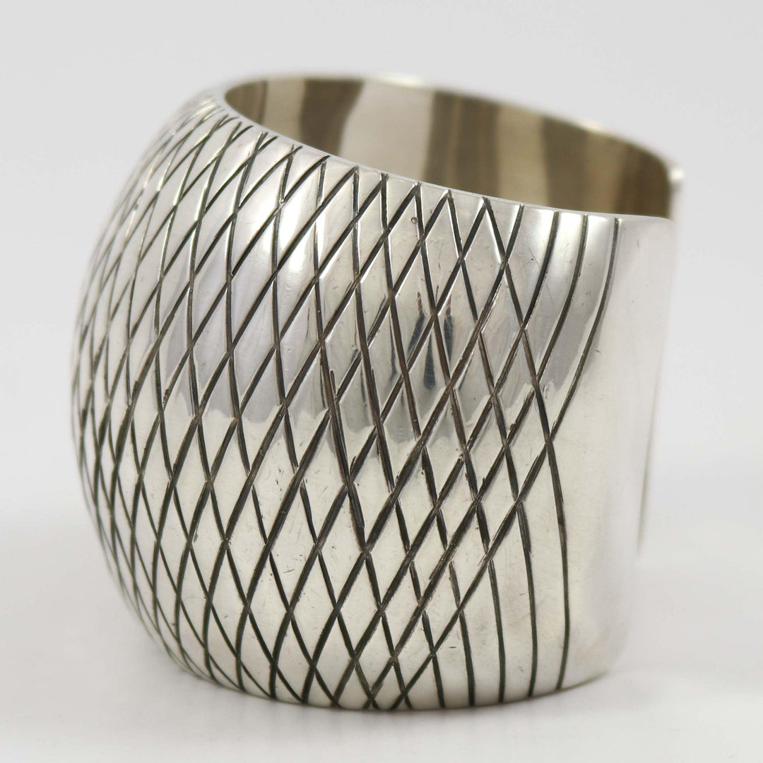 Wide Stamped Silver Cuff by Orville Tsinnie - Garland's