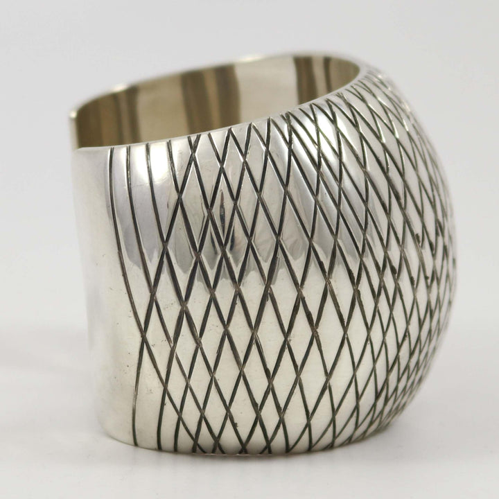 Wide Stamped Silver Cuff by Orville Tsinnie - Garland's