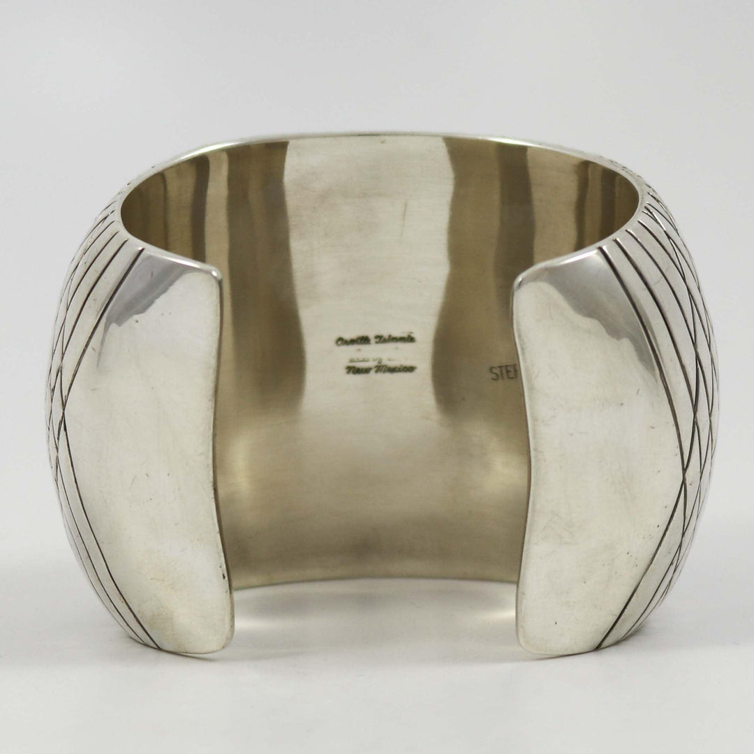 Wide Stamped Silver Cuff by Orville Tsinnie - Garland's