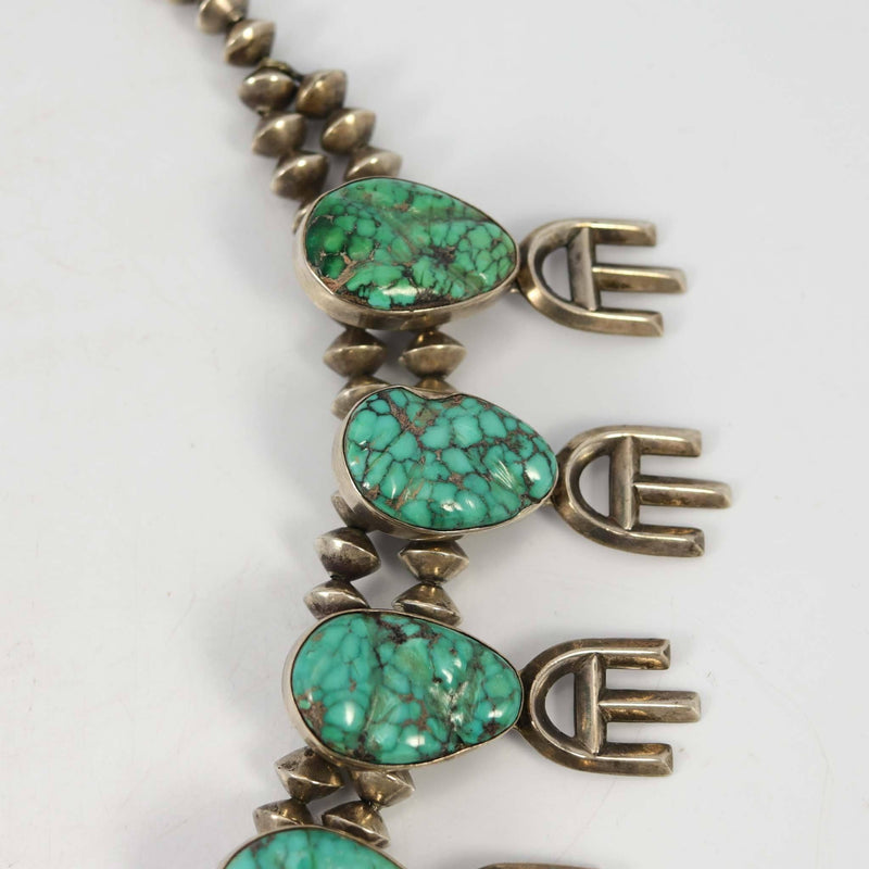 1970s Carico Lake Squash Blossom Necklace by Carl Allen Begay - Garland&
