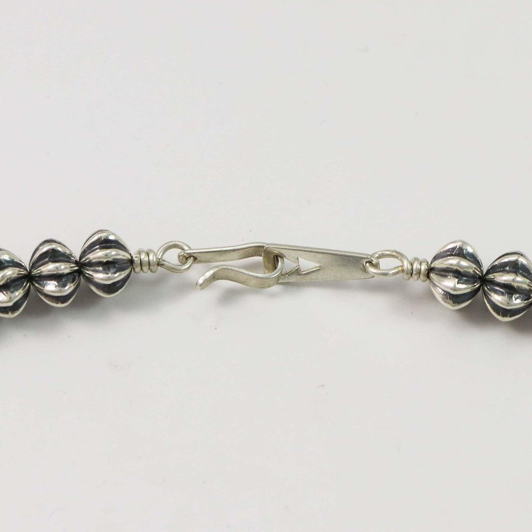Reversible Squash Blossom by Al Joe - Garland's
