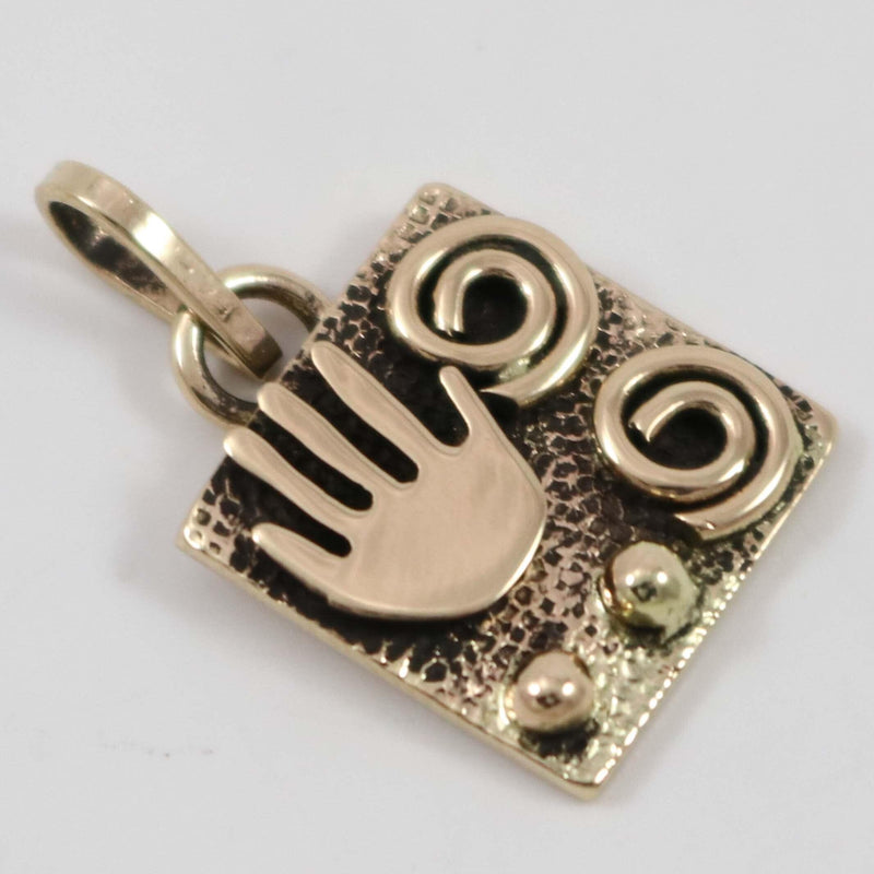 Gold Petroglyph Pendant by Alex Sanchez - Garland&