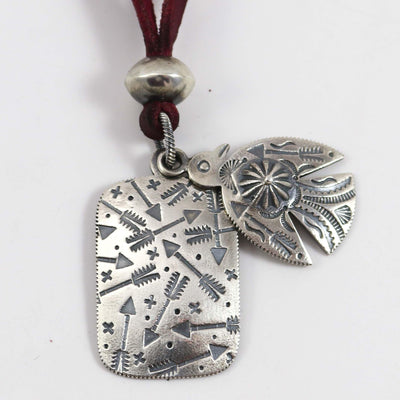 Thunderbird Dog Tag on Leather by Curtis Pete - Garland's