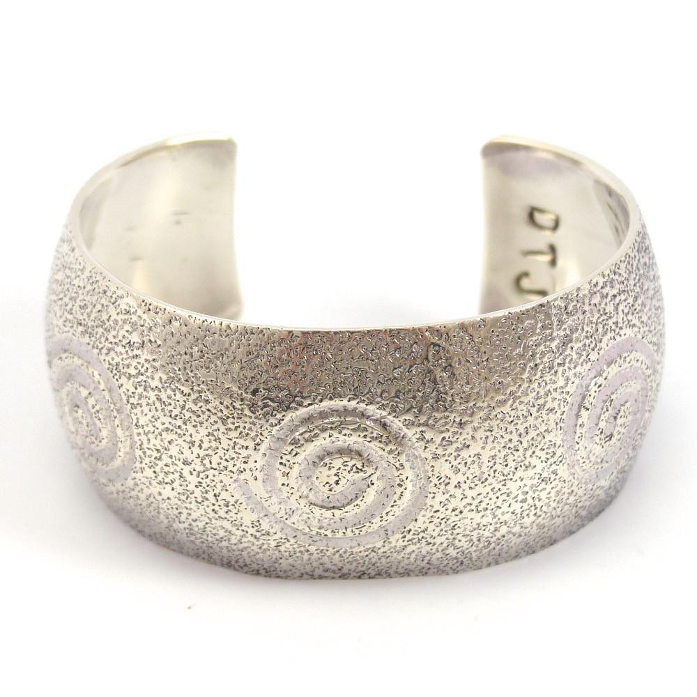 Migration Swirl Cuff by Derrick Joe - Garland's